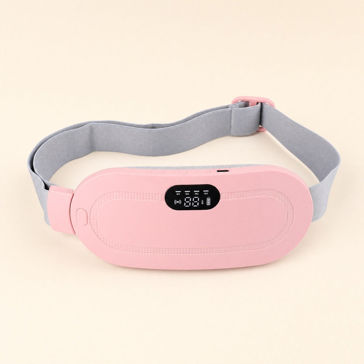Ceinture chauffante LUNARA vue de face : coque rose, écran de contrôle, sangle grise ajustable